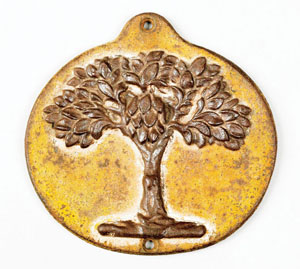 Cast-iron green tree fire mark, circa 1827, for the Mutual Assurance Co., Philadelphia, 8 1/4 inches high x 8 1/2 inches wide. Image courtesy of Pook & Pook Inc.